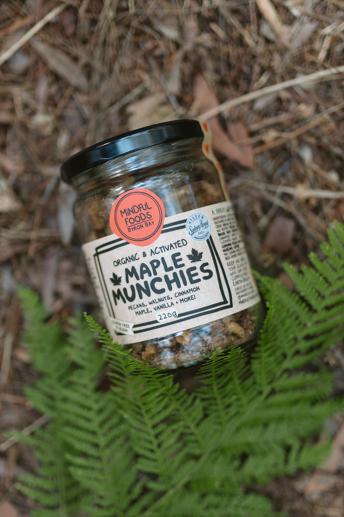 Mindful Foods Maple Munchies product close-up — Silver Award 2023 Fine Food Show, premium certified organic kombucha-activated nuts with caramel cinnamon crust, from $12.95